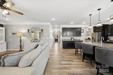 a dining room with furniture window wooden floor