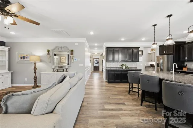 a dining room with furniture window wooden floor