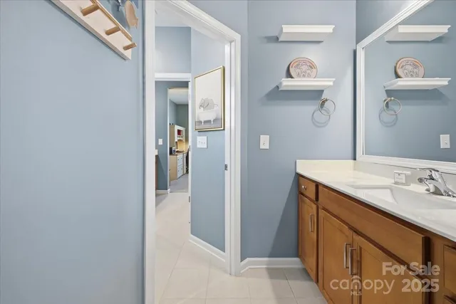 a bedroom with furniture and wooden floor