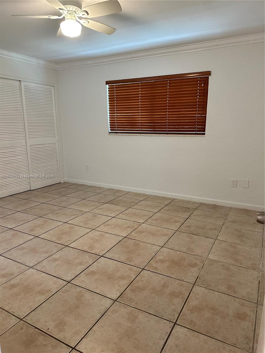 8600 Southwest 67th Avenue, Unit 908 Pinecrest, FL 33156 - Photo 12 of 25 a view of an empty room and window