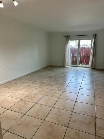 a view of a kitchen area with furniture