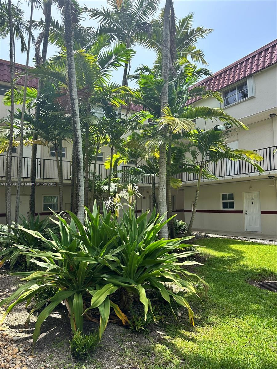 8600 Southwest 67th Avenue, Unit 908 Pinecrest, FL 33156 - Photo 6 of 25 a view of a swimming pool with a patio