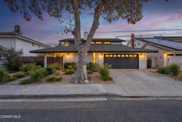 front view of a house with a street