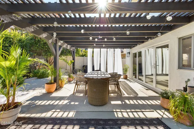 a view of swimming pool with seating space