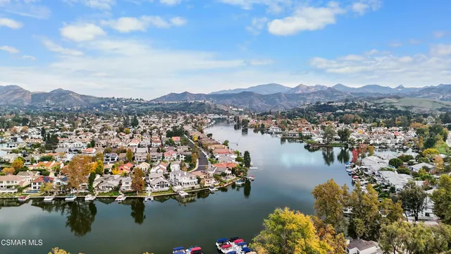 a view of a city with a lake