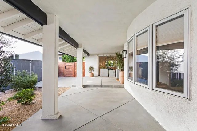 a view of a house with a garden
