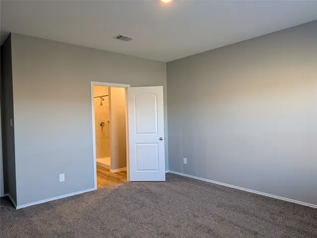 a bathroom with a sink and shower