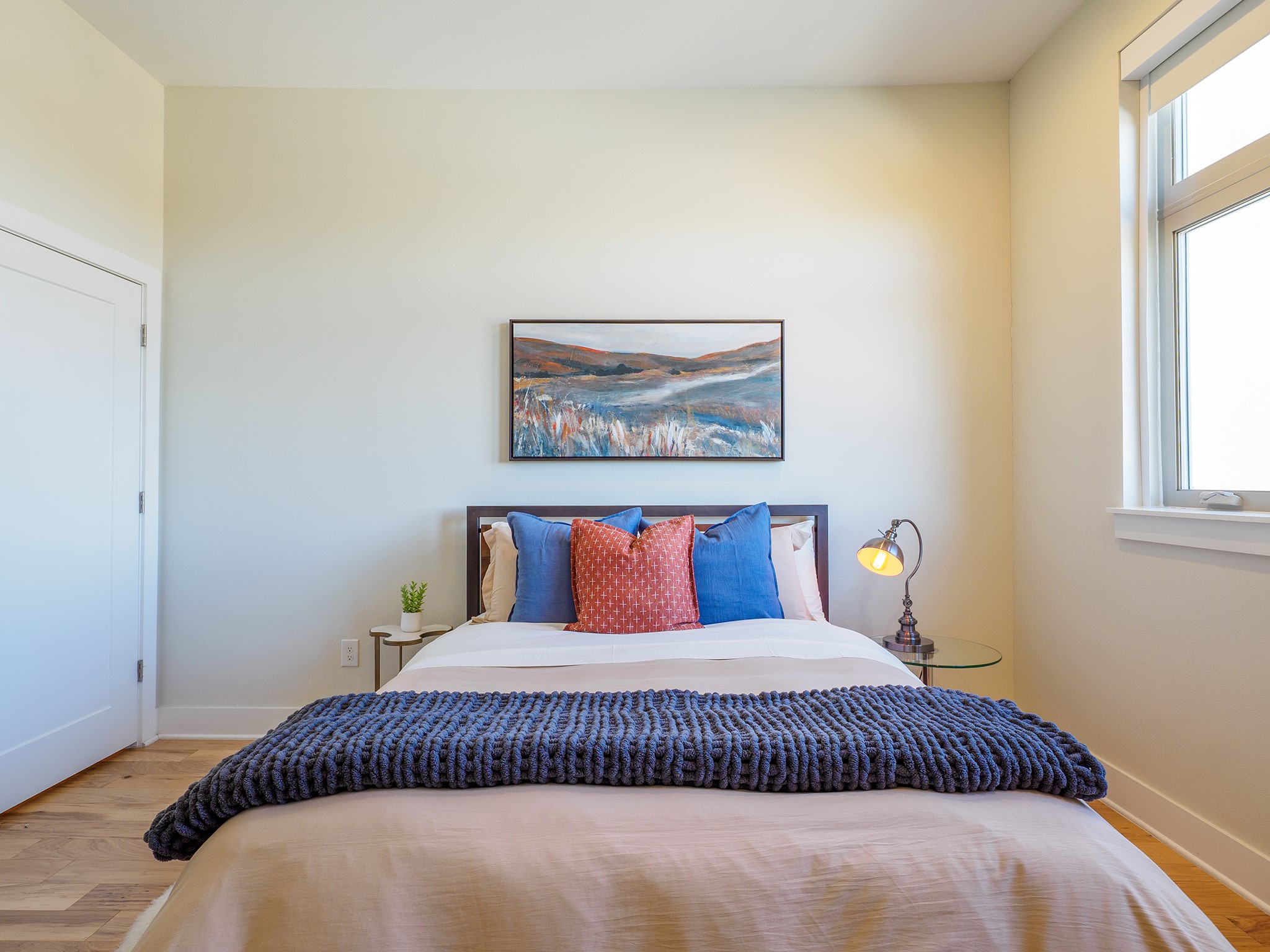 908 Nueces Street, Unit 44 Austin, TX 78701 - Photo 15 of 29 Bedroom featuring wood finished floors