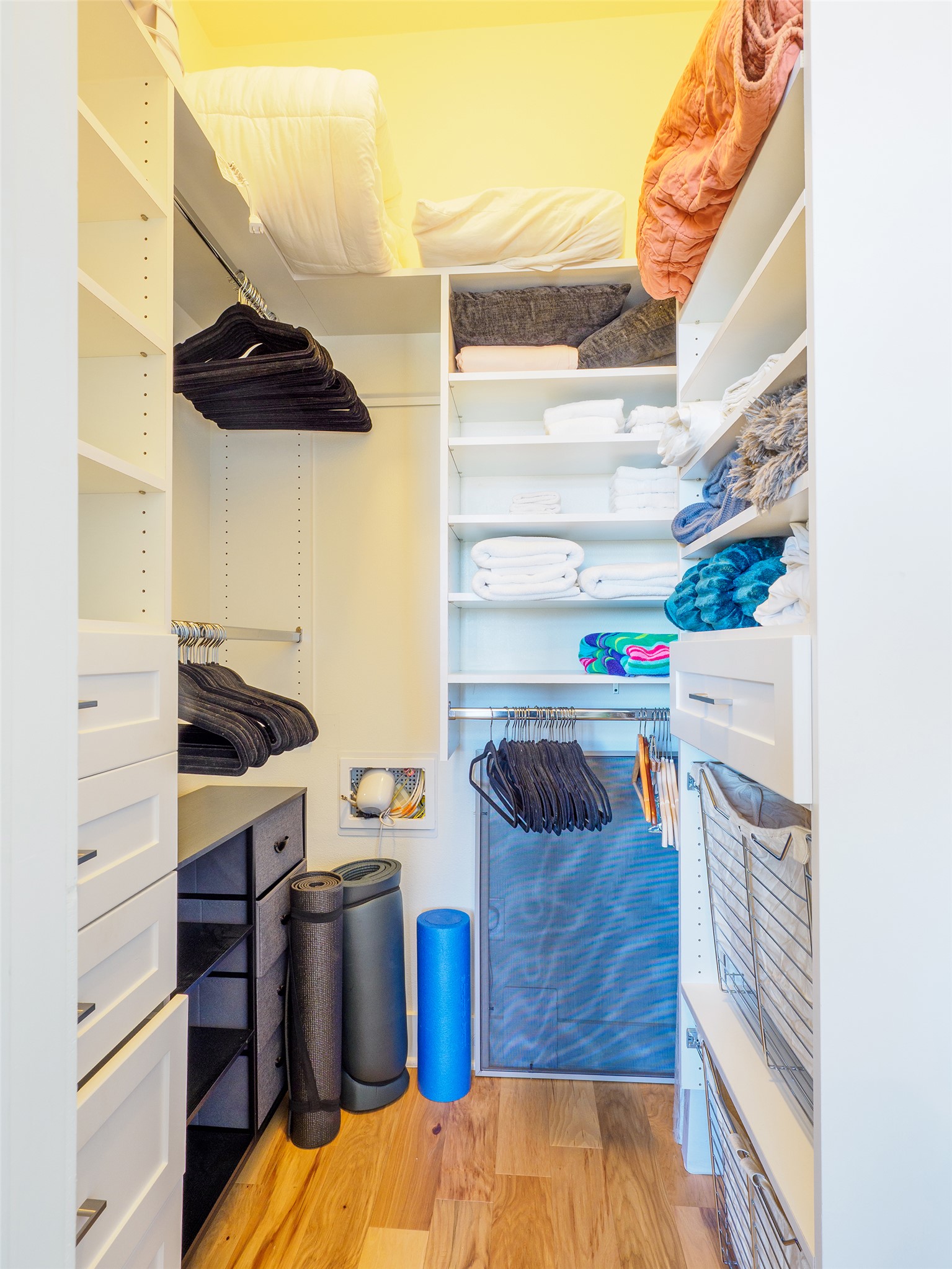 908 Nueces Street, Unit 44 Austin, TX 78701 - Photo 18 of 29 Walk in closet with light wood-style floors