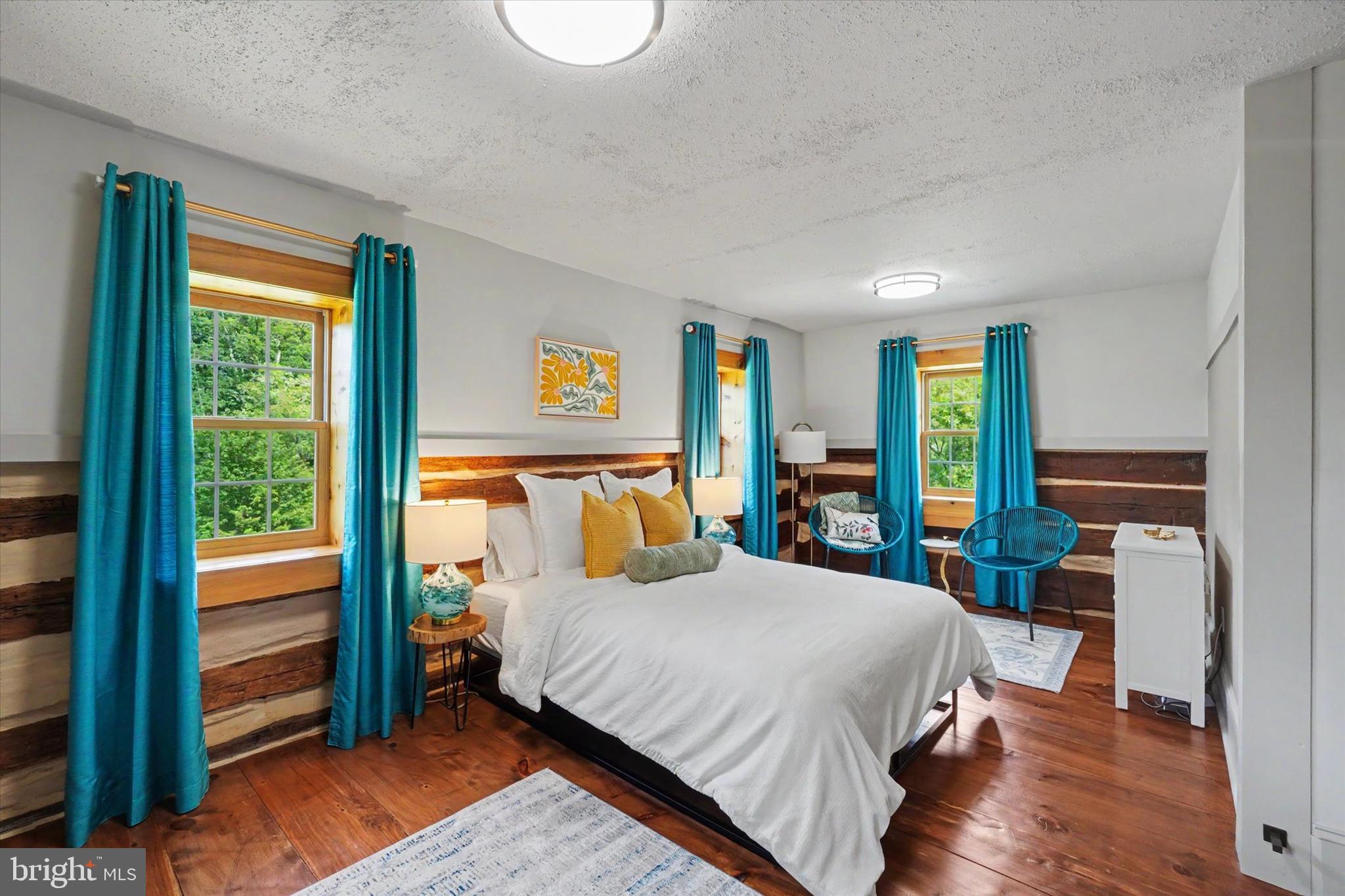 4941 Walters Hatchery Road Spring Grove, PA 17362 - Photo 63 of 71 a bedroom with a large bed and a window