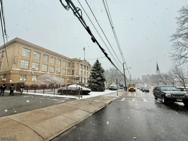 a view of a street with cars