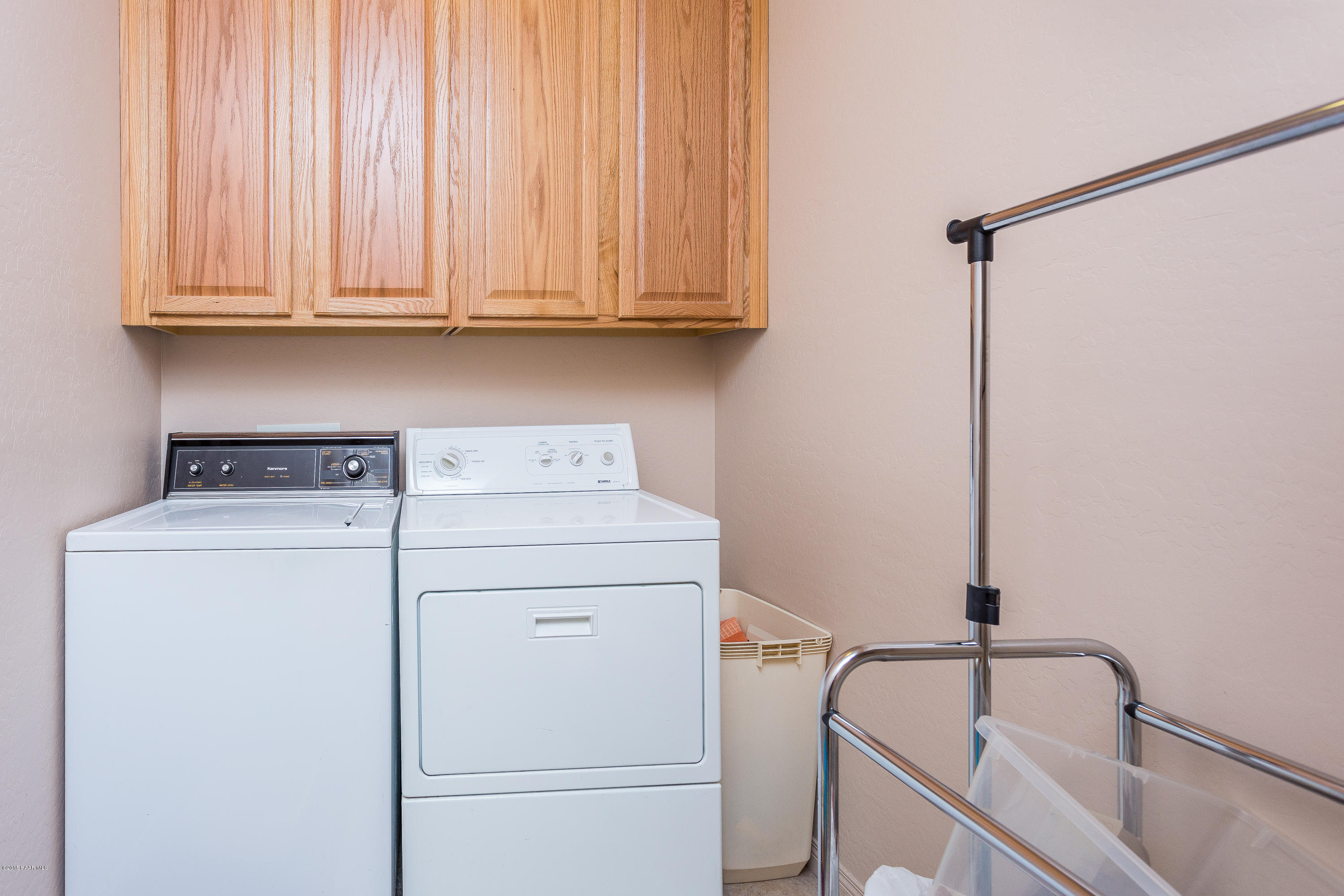 7861 North Rambling Lane Prescott Valley, AZ 86315 - Photo 13 of 15 a utility room with dryer and washer