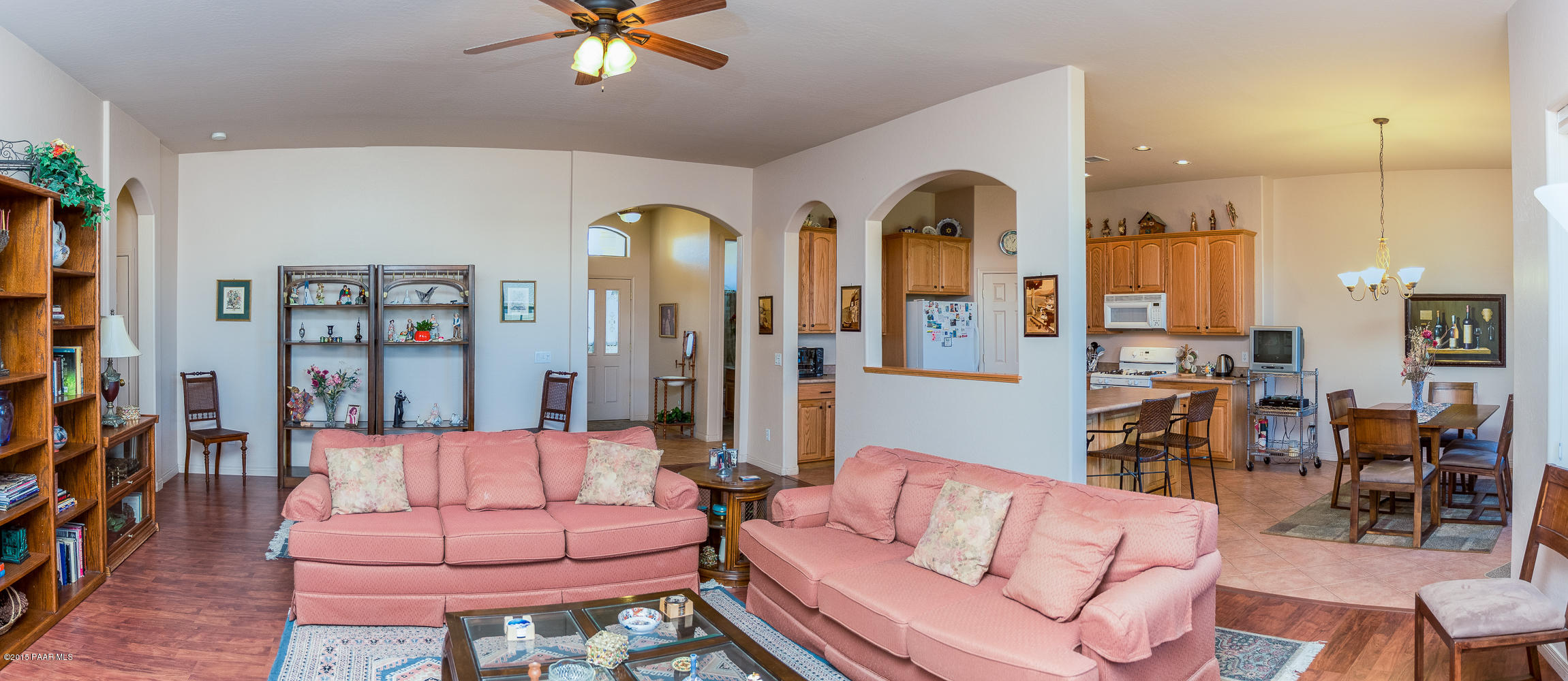 7861 North Rambling Lane Prescott Valley, AZ 86315 - Photo 2 of 15 a living room with furniture and wooden floor