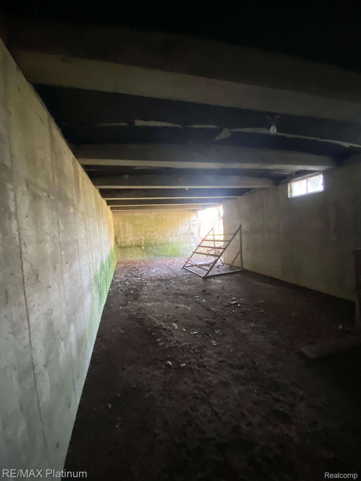 1215 South Bull Run Road Fowlerville, MI 48836 - Photo 74 of 80 Bomb shelter/root cellar is built like bank vault