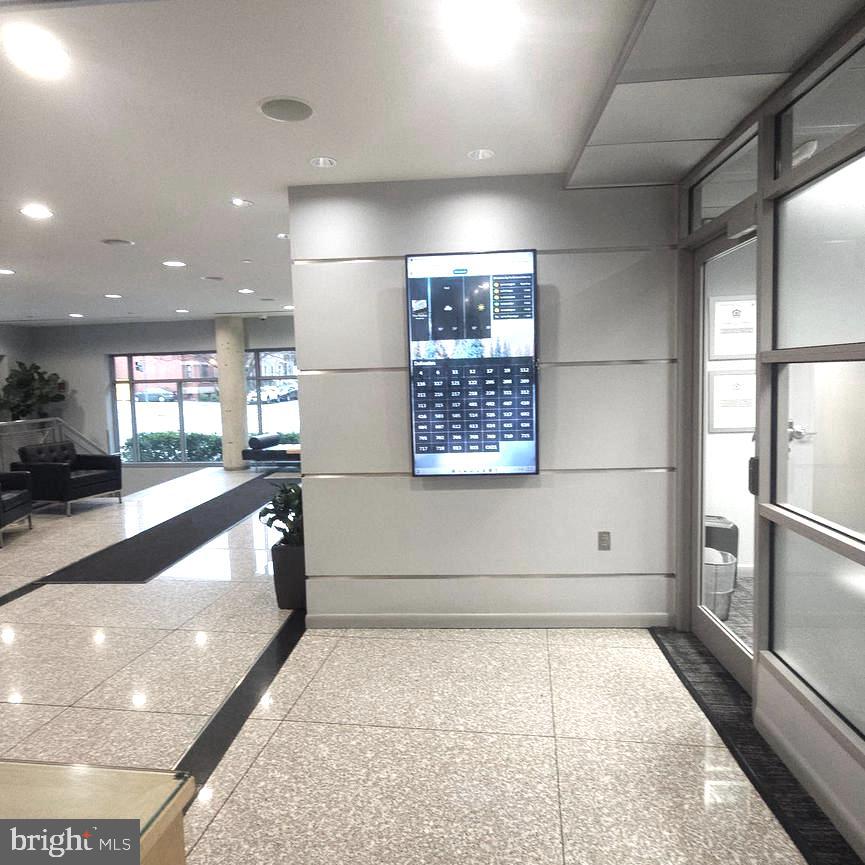 1300 N Street Northwest, Unit 713 Washington, DC 20005 - Photo 20 of 33 a view of an empty room and a window