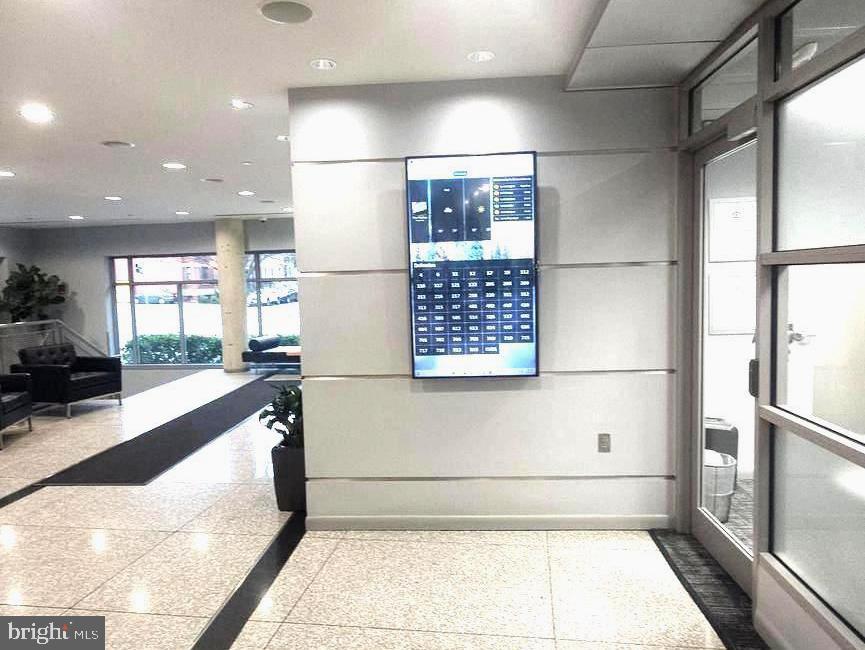 1300 N Street Northwest, Unit 713 Washington, DC 20005 - Photo 22 of 38 a view of a hallway with wooden floor