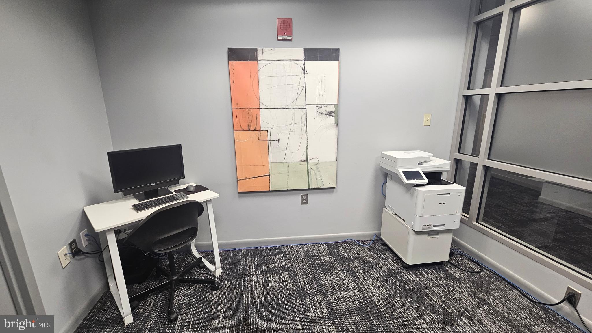 1300 N Street Northwest, Unit 713 Washington, DC 20005 - Photo 23 of 38 a workspace with furniture and window