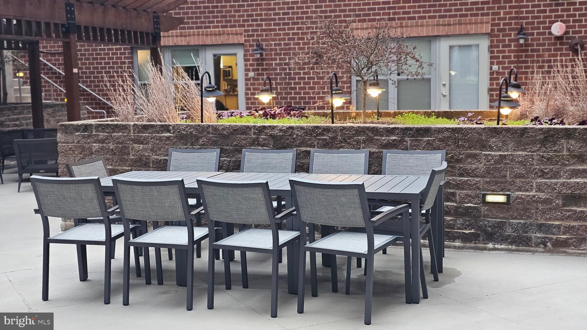 1300 N Street Northwest, Unit 713 Washington, DC 20005 - Photo 25 of 38 a view of a dining room with furniture and wooden floor