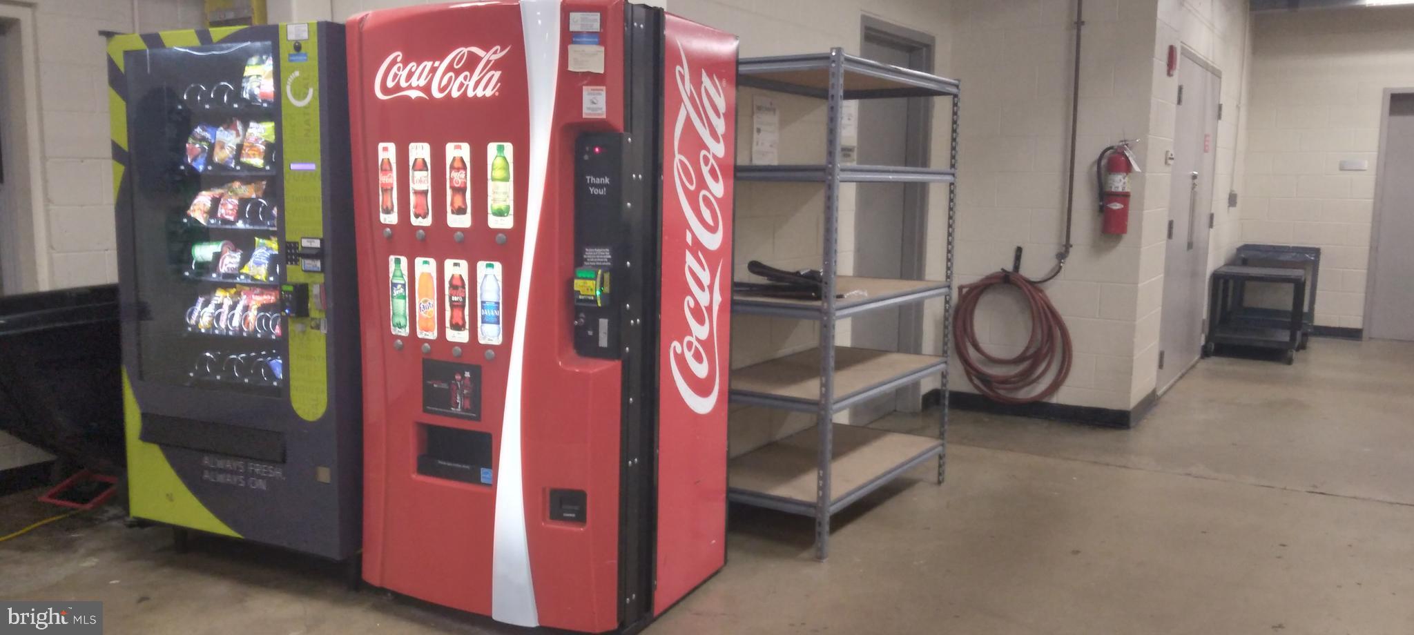 1300 N Street Northwest, Unit 713 Washington, DC 20005 - Photo 29 of 38 a utility room with multiple dryer and washer