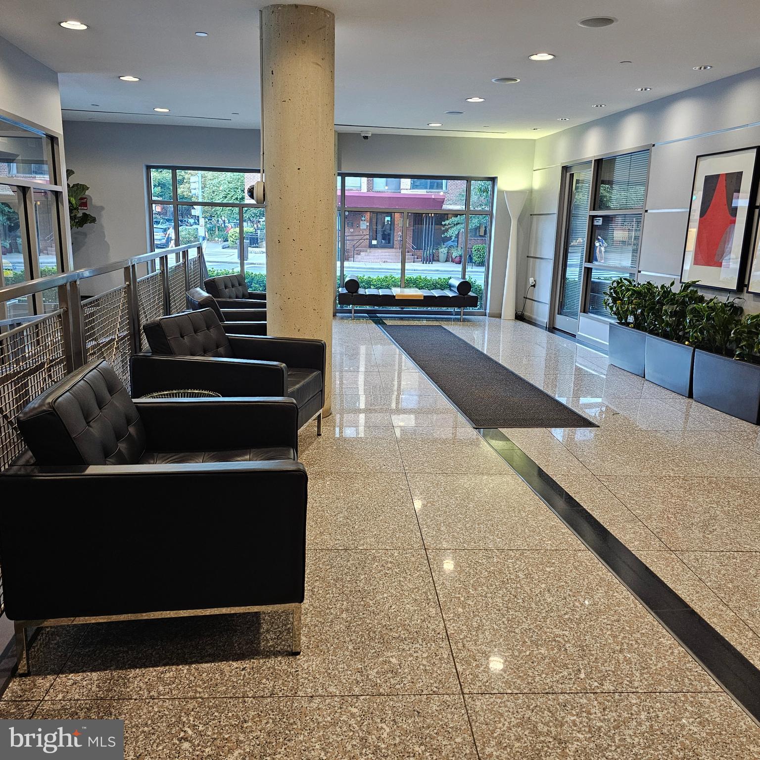 1300 N Street Northwest, Unit 713 Washington, DC 20005 - Photo 4 of 33 a view of a living room and a balcony