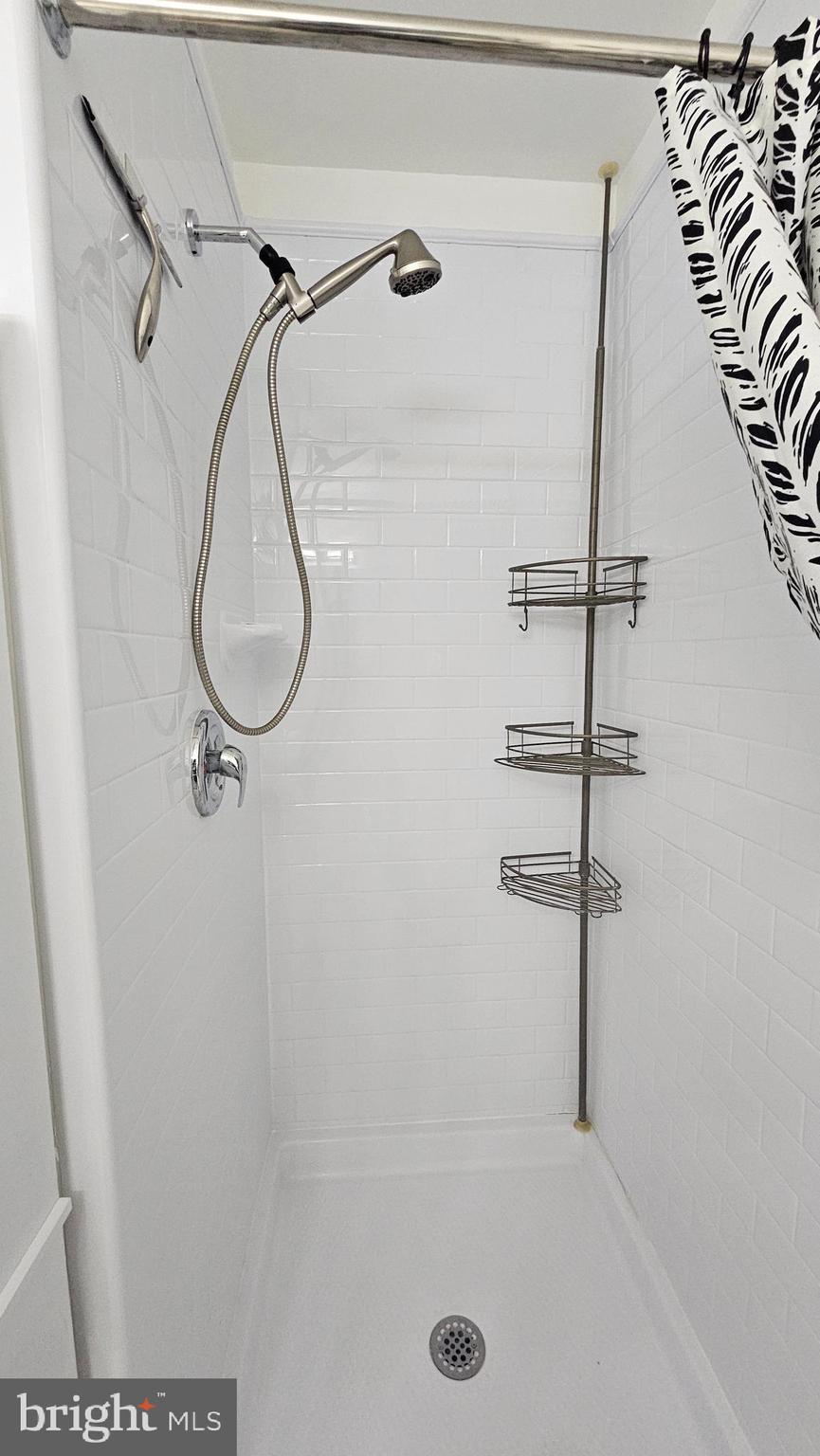 1300 N Street Northwest, Unit 713 Washington, DC 20005 - Photo 8 of 33 a bathroom with a shower