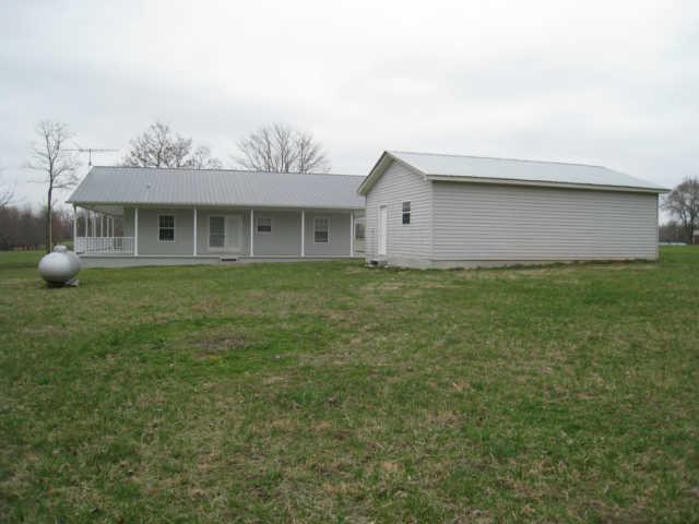 7004 Williams Road Cross Plains, TN 37049 - Photo 4 of 18 a house view with a garden space