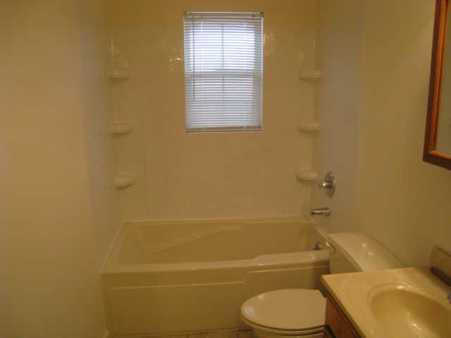 7004 Williams Road Cross Plains, TN 37049 - Photo 10 of 18 a bathroom with a toilet and a sink
