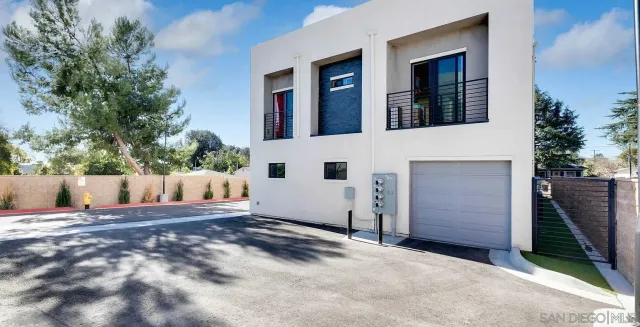 a view of backyard with small cabin