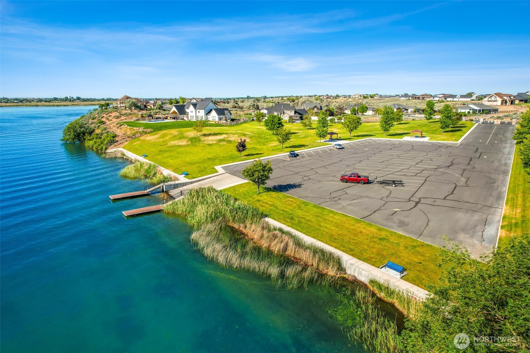 8084 Dune Lake Road Southeast Moses Lake, WA 98837 - Photo 11 of 15 swimming pool with an ocean view