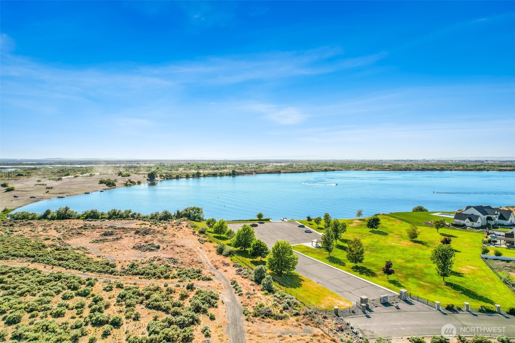 8084 Dune Lake Road Southeast Moses Lake, WA 98837 - Photo 12 of 15 a view of lake with green space