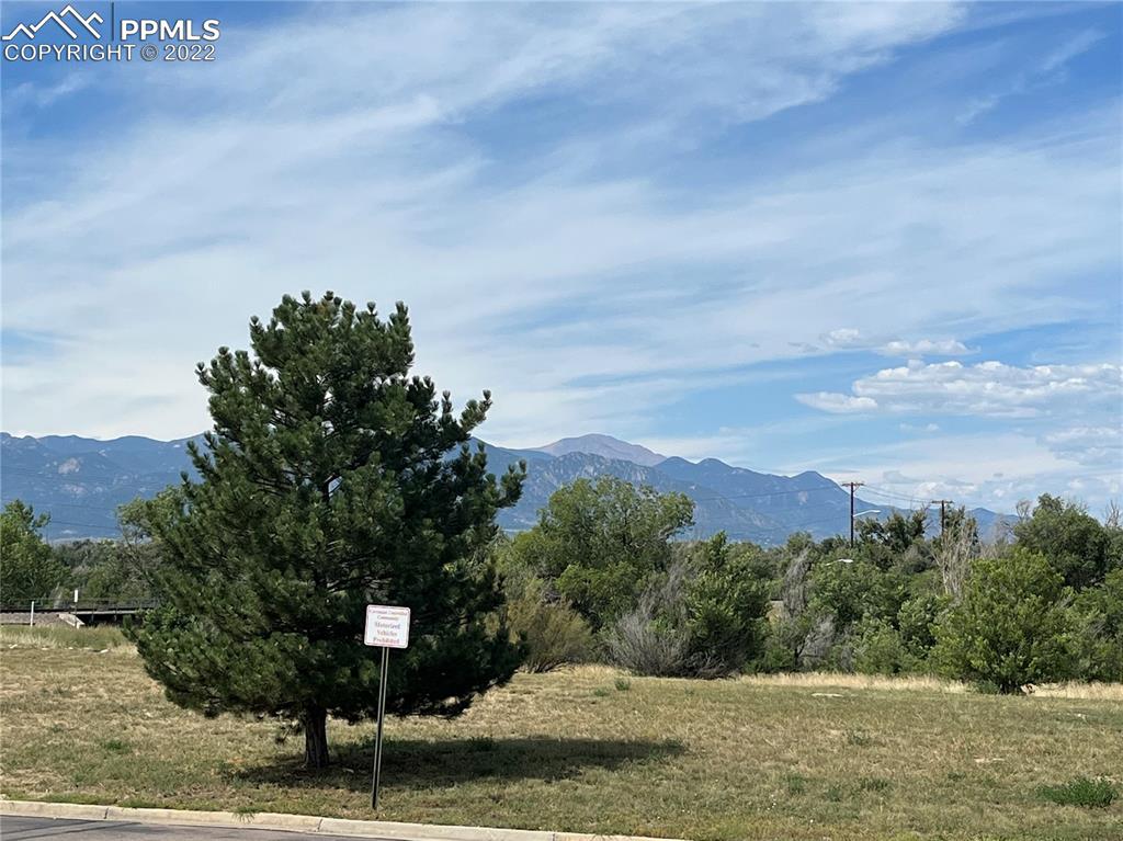 7306 Countryside Grove Fountain, CO 80817 - Photo 3 of 9 a view of a lake with a mountain in the background