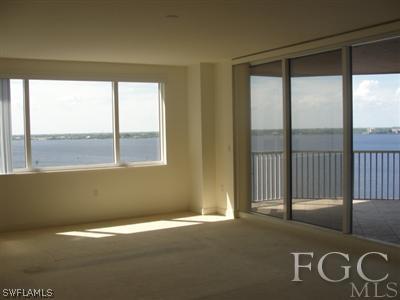 2104 West First Street, Unit 1101 Fort Myers, FL 33901 - Photo 3 of 7 a view of empty room with windows