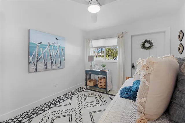 a bathroom with a sink toilet and mirror