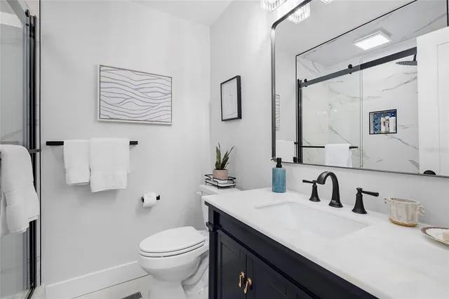 a bathroom with a bathtub and shower