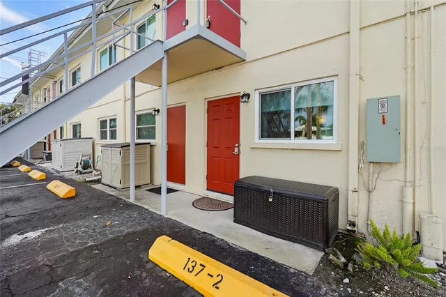 a view of street with parked cars