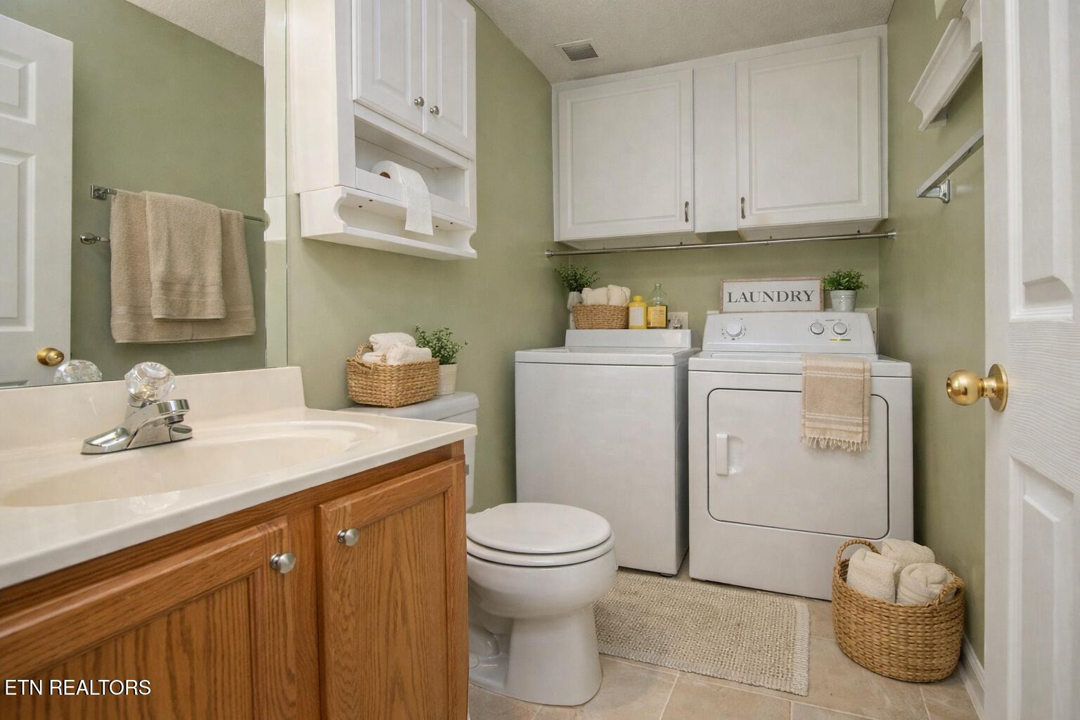 3209 Quiet Way Knoxville, TN 37918 - Photo 12 of 29 Serene hall bathroom and laundry combo