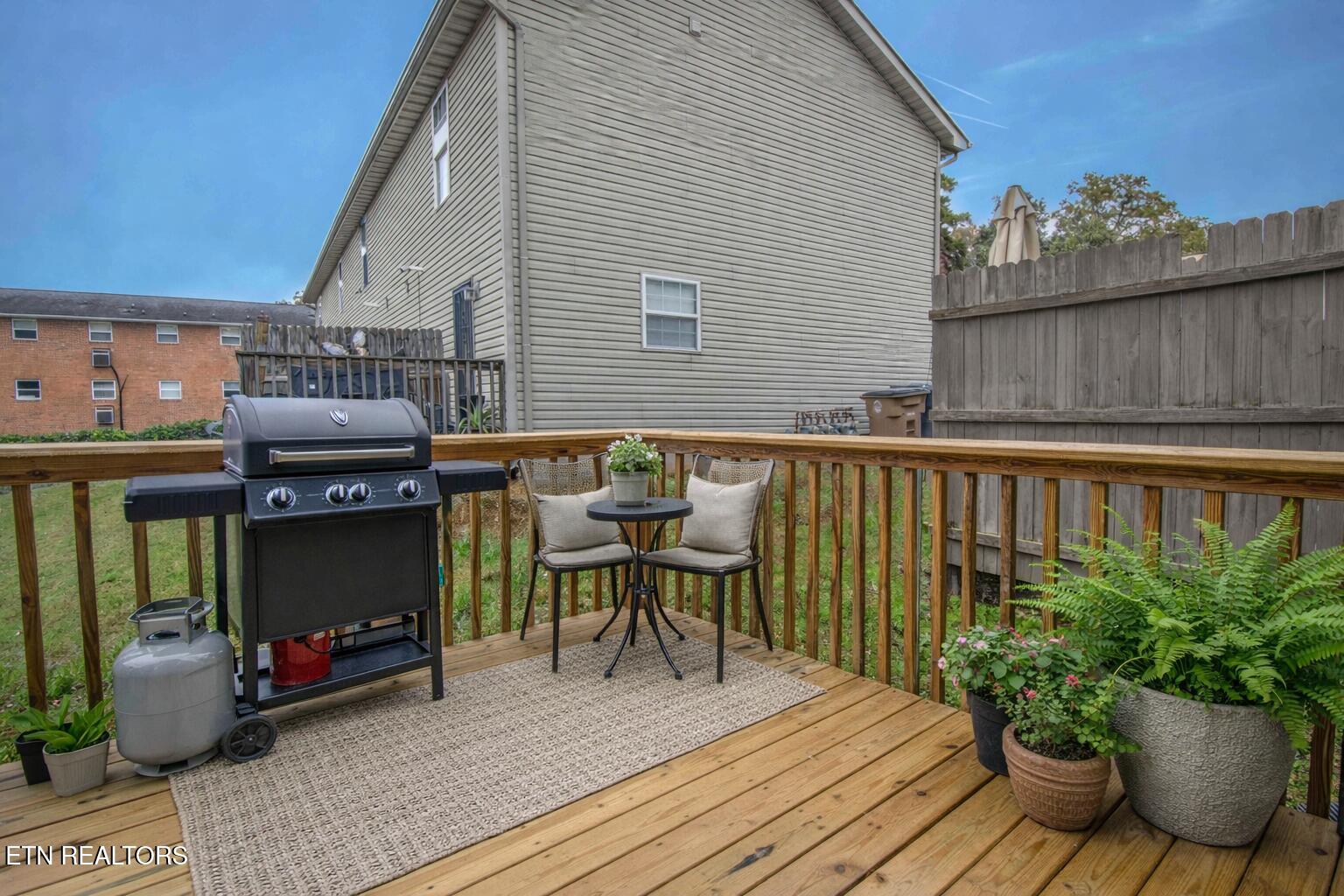 3209 Quiet Way Knoxville, TN 37918 - Photo 25 of 29 Backyard deck with plants and grill