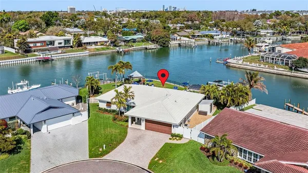 an aerial view of a house with outdoor space