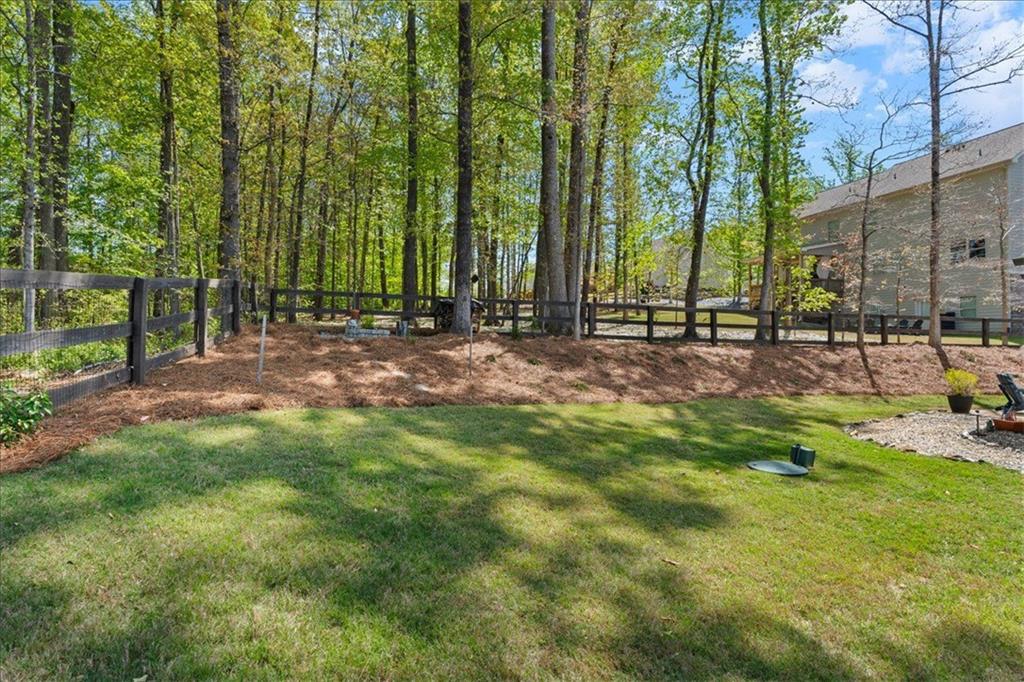 7610 Scenic Overlook Cumming, GA 30041 - Photo 41 of 62 a view of backyard with outdoor and green space