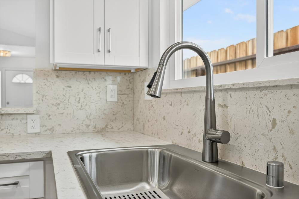 6237 Riverbelle Court Rio Linda, CA 95673 - Photo 16 of 50 a close view of a sink a faucet and a window