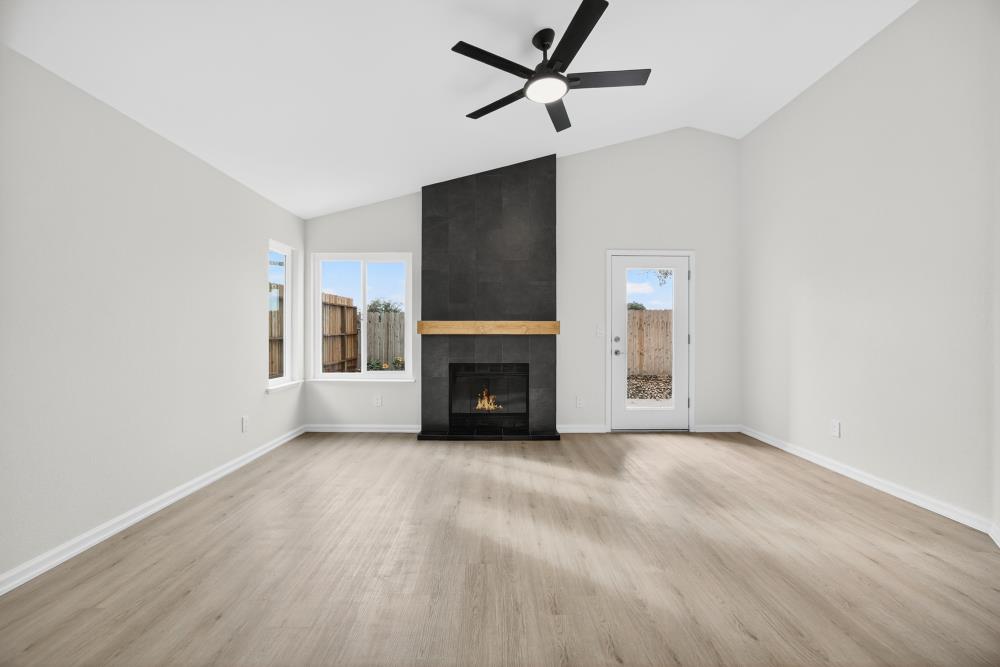 6237 Riverbelle Court Rio Linda, CA 95673 - Photo 18 of 50 a view of empty room with a fireplace