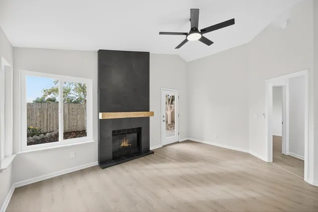 a view of a livingroom with a kitchen