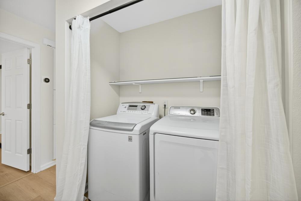 6237 Riverbelle Court Rio Linda, CA 95673 - Photo 32 of 50 a utility room with dryer and washer