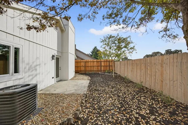 a backyard of a house with lots of green space