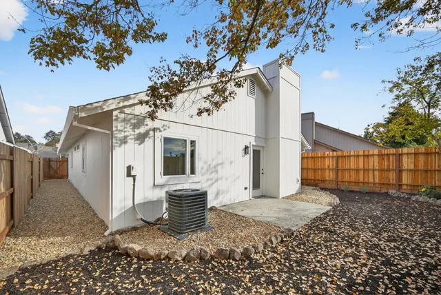 a view of a house with a snow in the yard