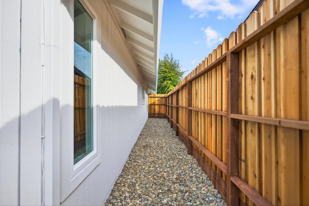 6237 Riverbelle Court Rio Linda, CA 95673 - Photo 46 of 50 a view of a balcony with wooden floor and stairs