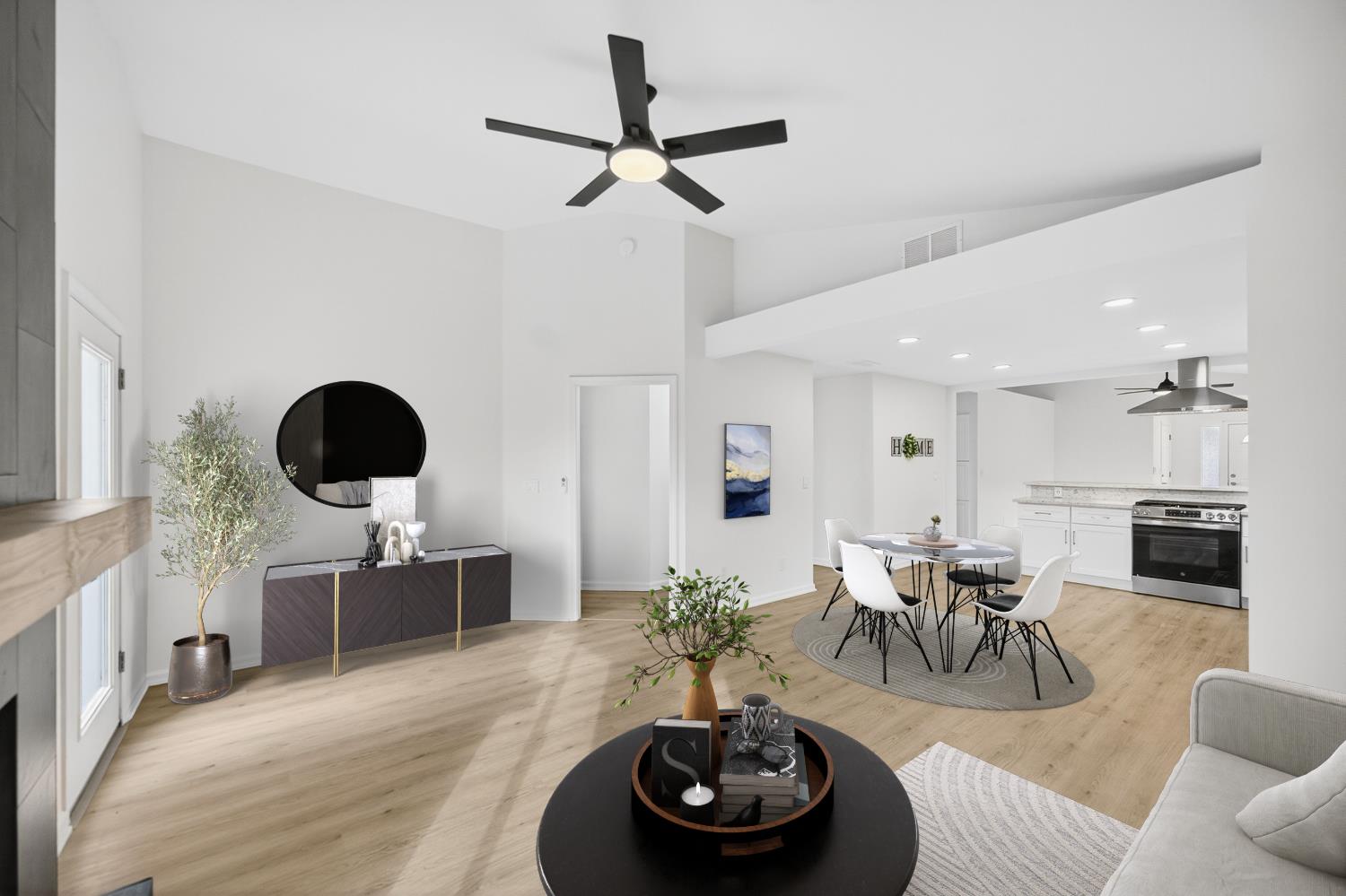 6237 Riverbelle Court Rio Linda, CA 95673 - Photo 6 of 50 a living room with furniture and a wooden floor