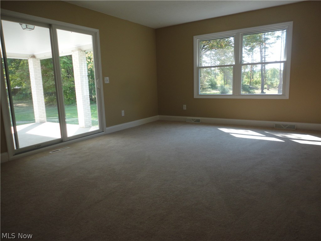19646 Prospect Road Strongsville, OH 44149 - Photo 15 of 32 Master bedroom ( 14 X 20 ) located to rear of house with sliding glass doors to the covered patio. Master walk in closet and bath attached.