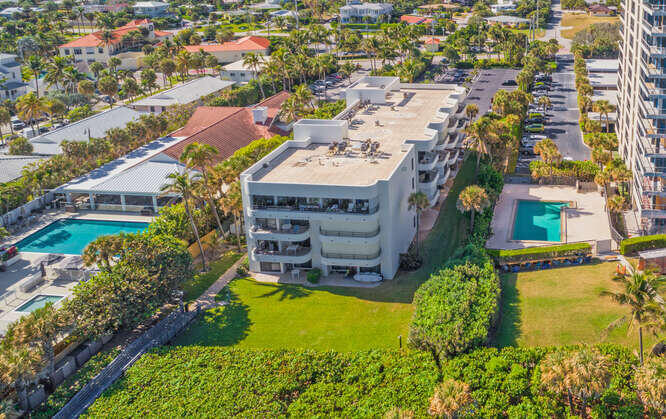 420 Celestial Way, Unit 101 Juno Beach, FL 33408 - Photo 22 of 39 an aerial view of a house with a garden