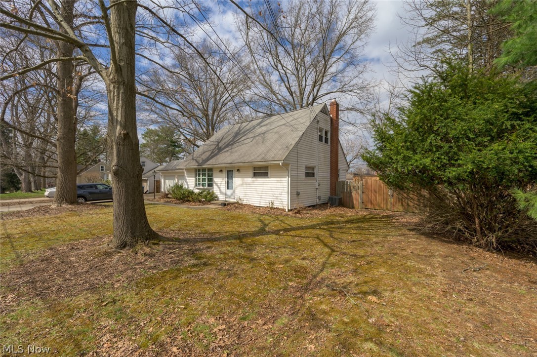 1165 Hampton Road Kent, OH 44240 - Photo 37 of 39 View of property exterior with a chimney